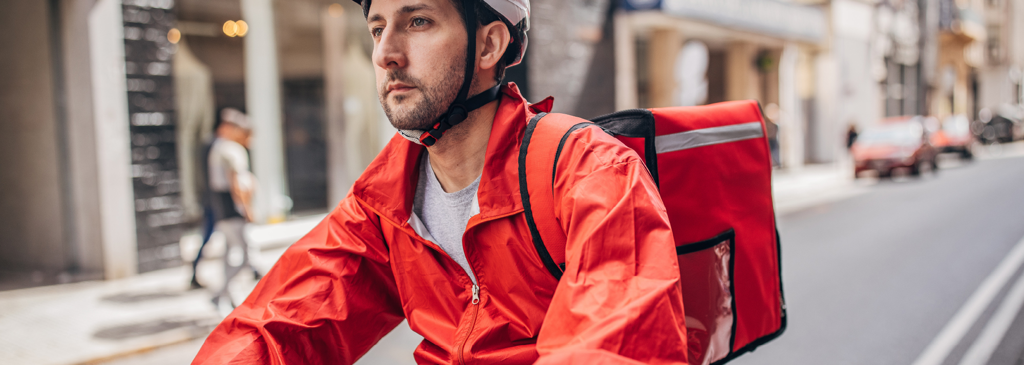 A close up portrait of a bike messenger.
