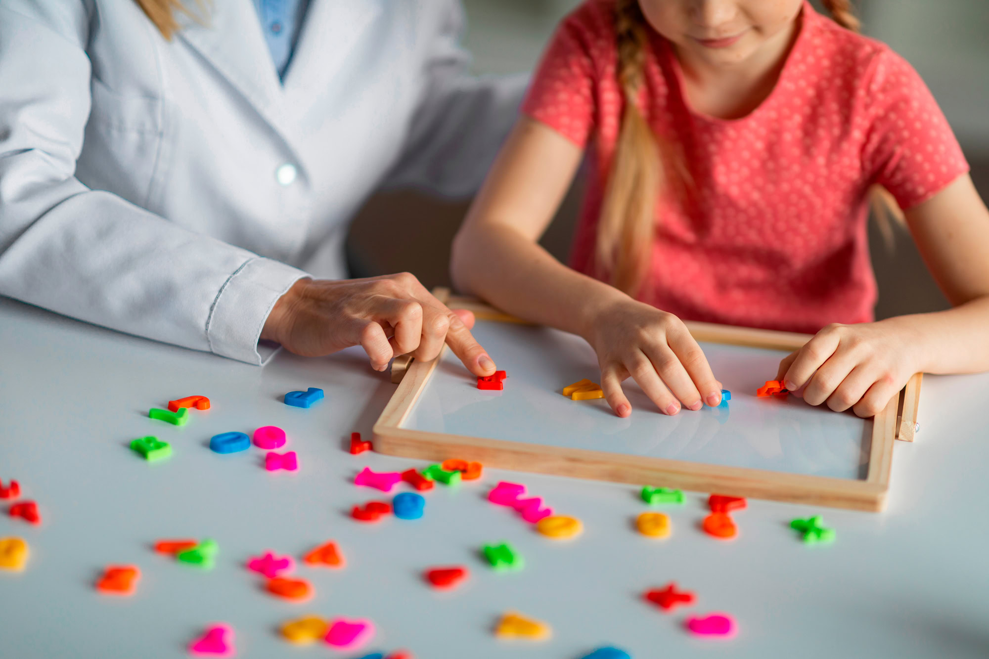 Kids Development Classes. Unrecognizable little girl playing educational games during psychological consultation
