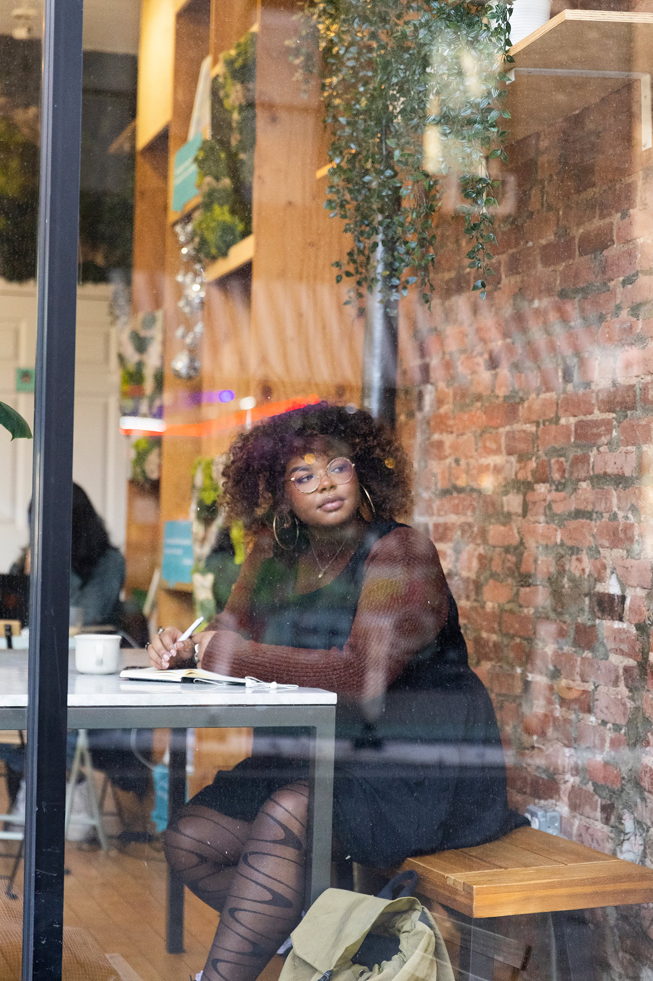mph-woman-window-cafe