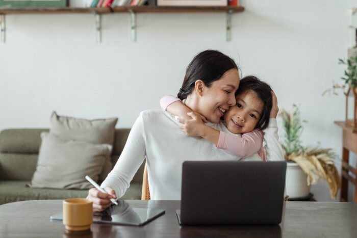 A family reviewing their health coverage options with MetroPlusHealth's BronzePlus Plan, designed for NYC residents.