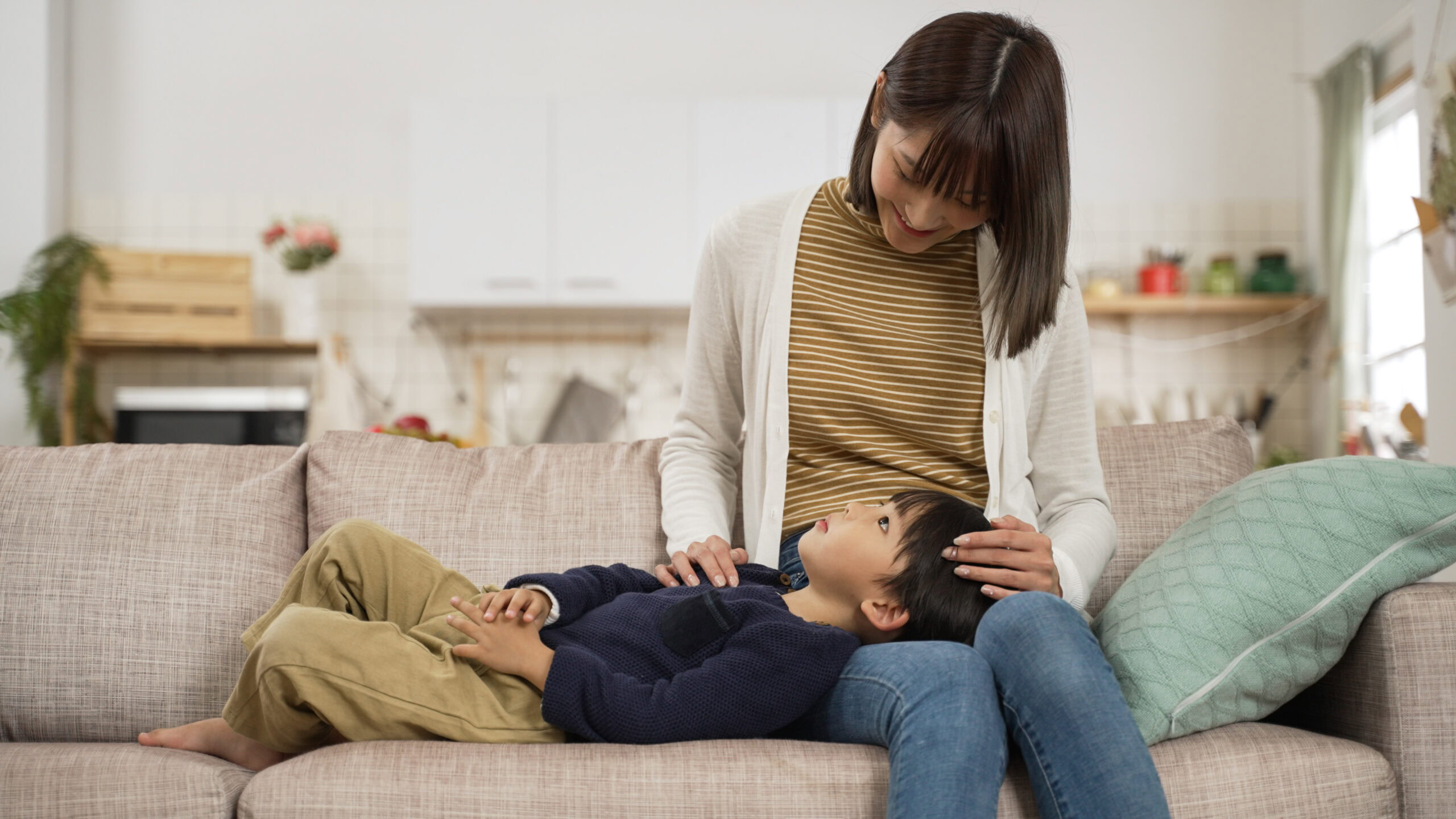 Smiling family, symbolizing peace of mind with affordable Qualified Health Plans (QHP) through NY State of Health.