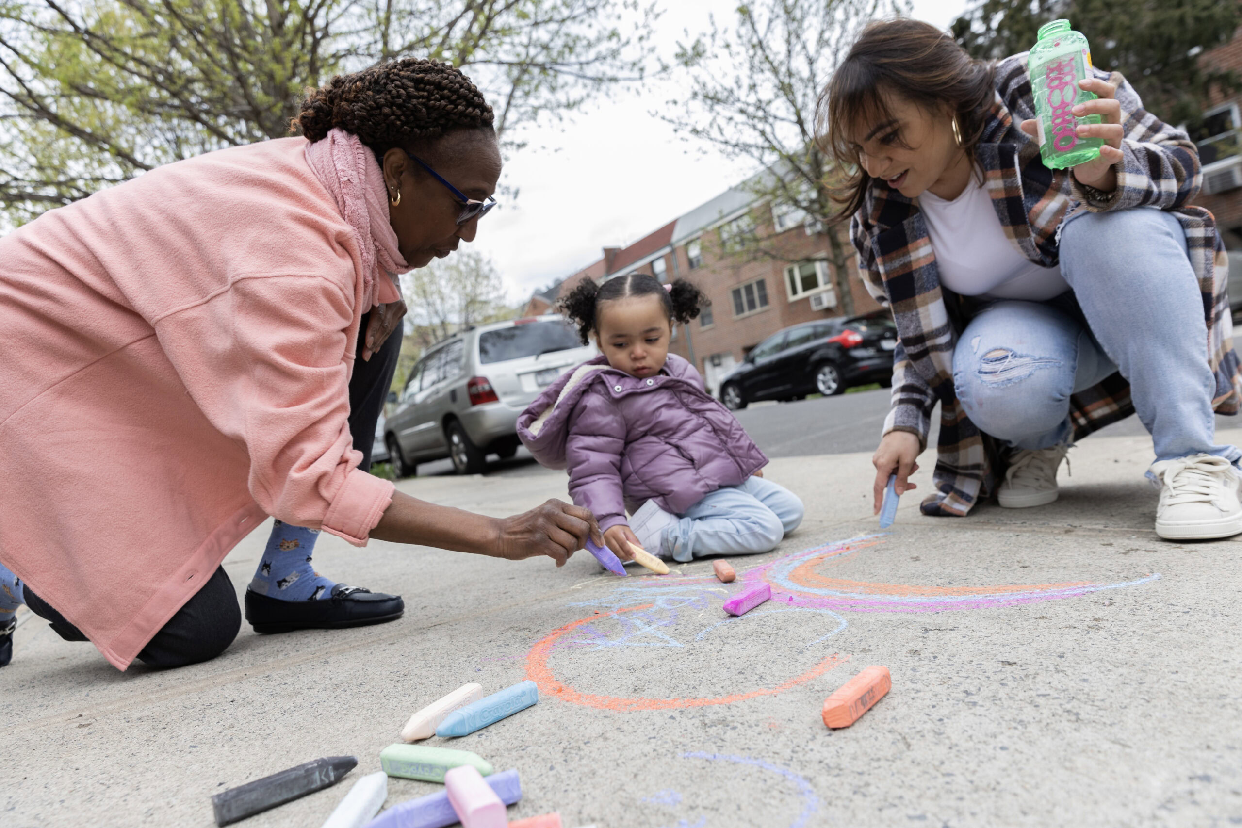 Family enjoying healthy day outdoors, symbolizing access to quality healthcare.